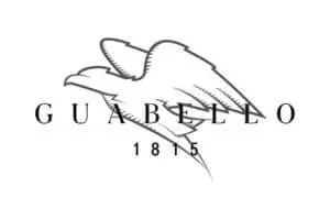 Guabello 1815 logo featuring a stylized bird design for luxury tailoring.